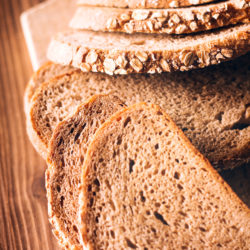 Brown bread on an old wooden table